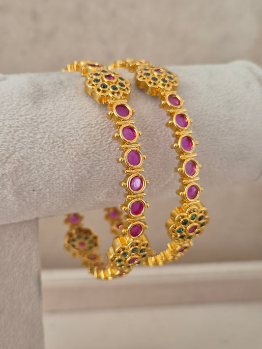 Pavanika Bangles set of 2 – traditional gold-plated ethnic bangles with ruby stone and emerald work by Naitri.in