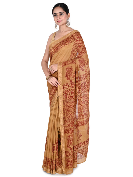 beige and maroon hand block printed cotton-silk saree by Naitri. Traditional Bagh print saree with gold zari border, includes blouse piece by naitri.in