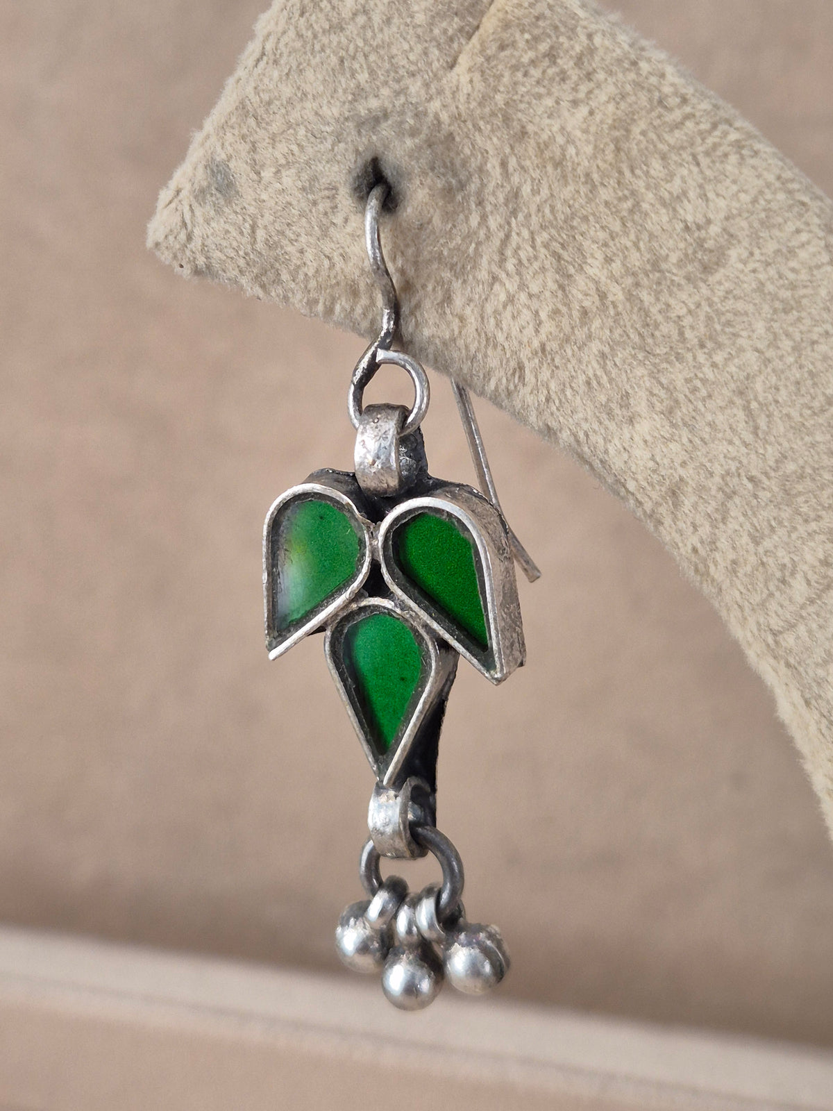 Pair of green leaf-shaped glass drop earrings with silver bead details, Handcrafted green glass dangle earrings with silver alloy accents by naitri.in