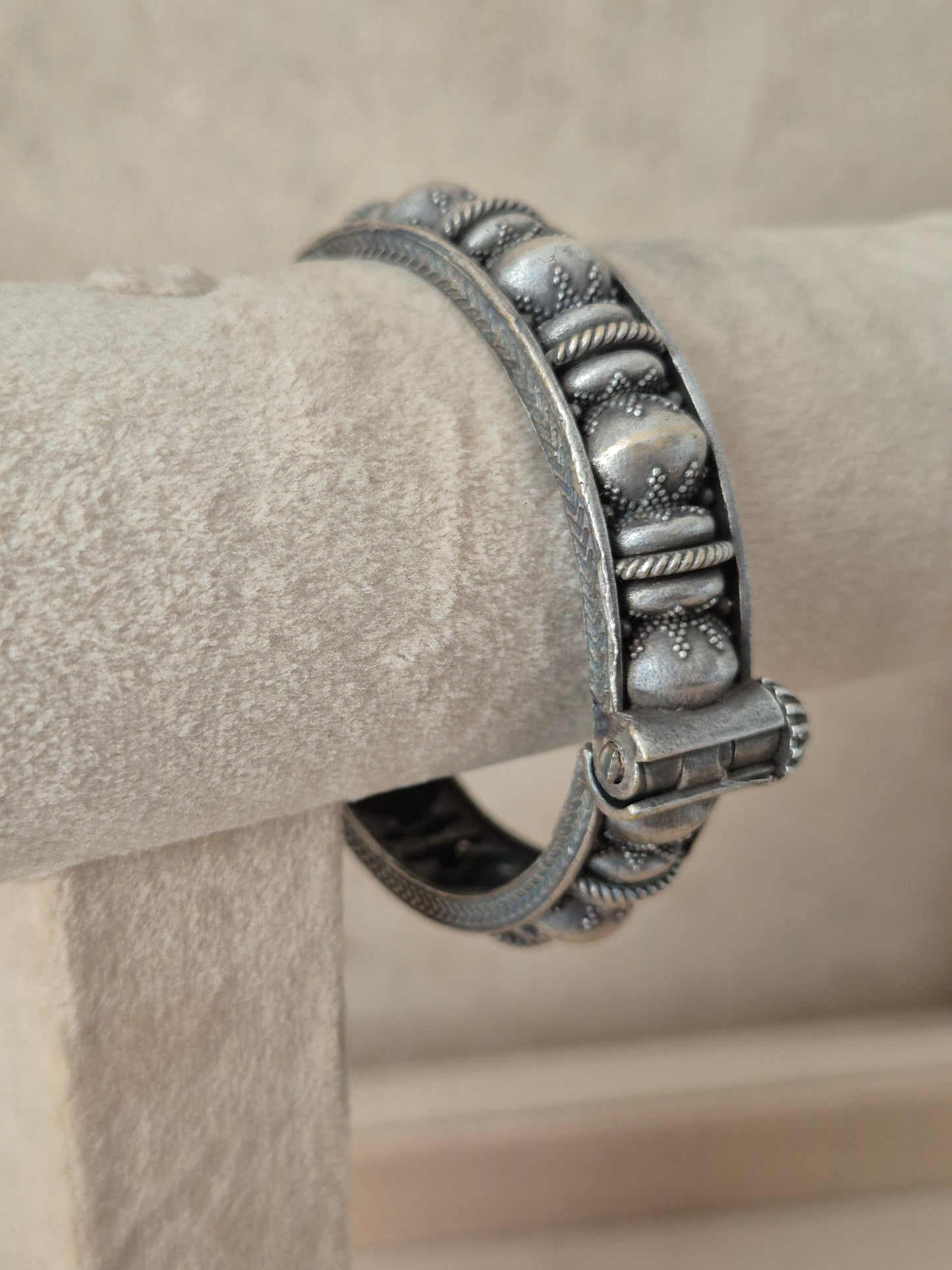 Close-up of Naitri Warisha premium silver oxidized bangle bracelet featuring traditional Indian style metalwork and geometric engraving by naitri.in