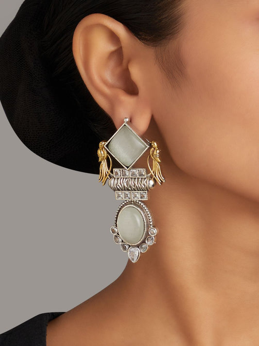 Gold and white dangle earrings, Cheena by Naitri, ethnic style shown upright.