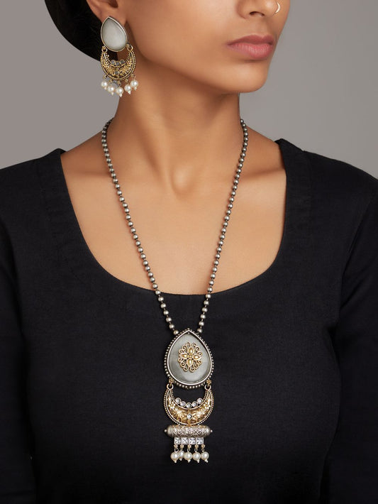 Gold and silver white dangle necklace set, Ziya by Naitri, beaded pendant.