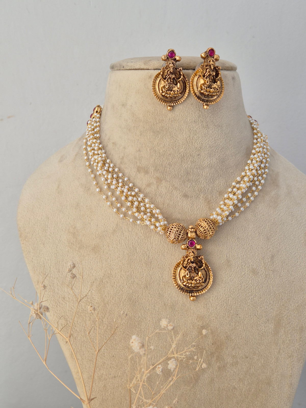 Handcrafted brass alloy ethnic layered necklace and traditional earrings by Naitri.in