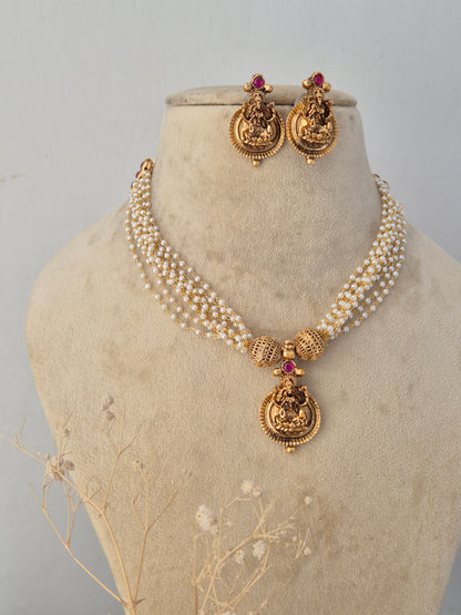 Handcrafted brass alloy ethnic layered necklace and traditional earrings by Naitri.in