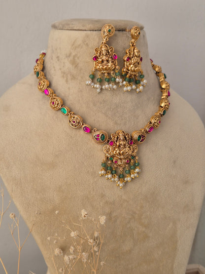Gold-plated traditional Devi necklace set with gemstone by Naitri.in
