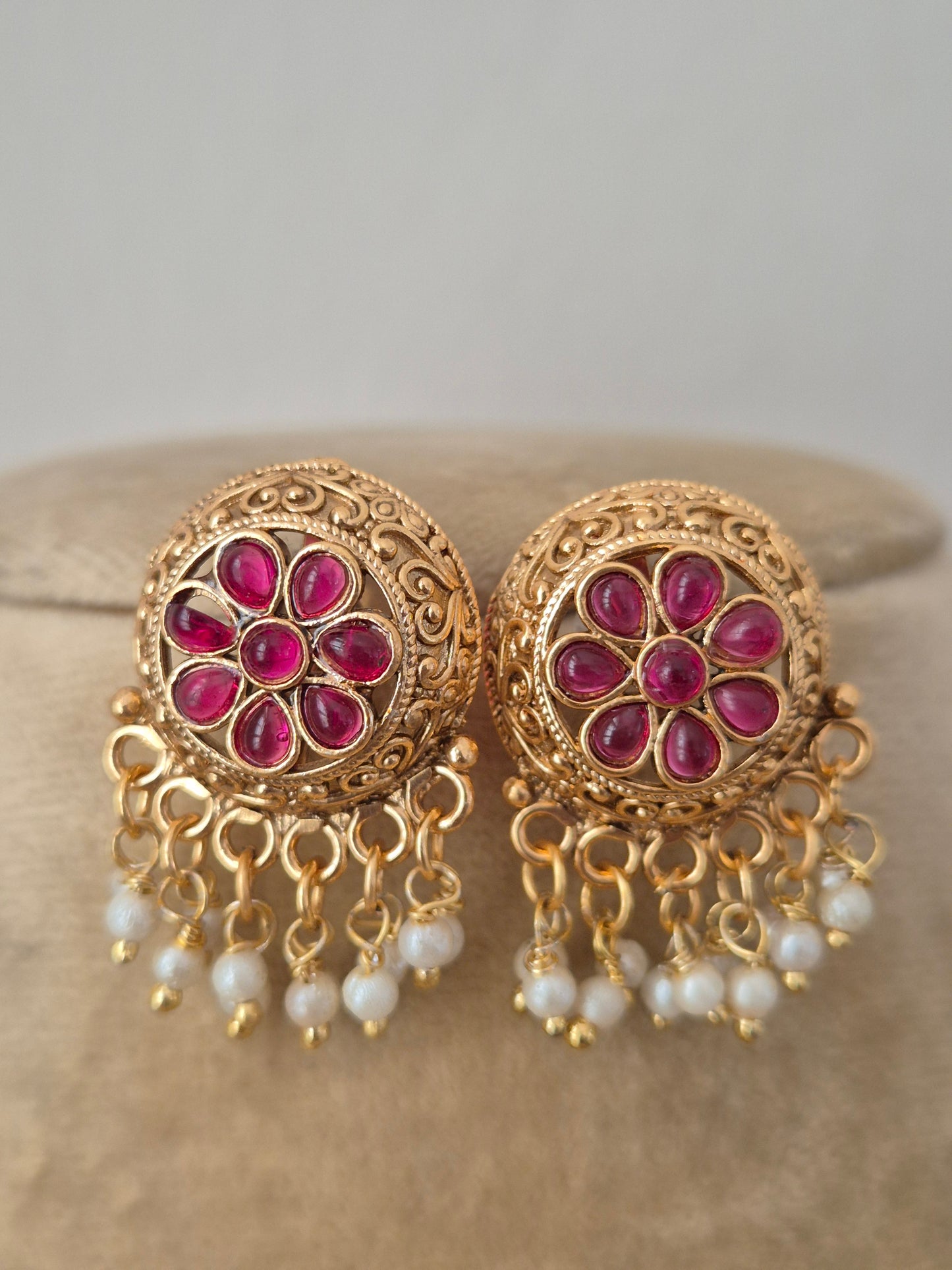 Vintage-style floral earrings, featuring fine flower wirework and a polished earrings with hanging golden beads by naitri.in 