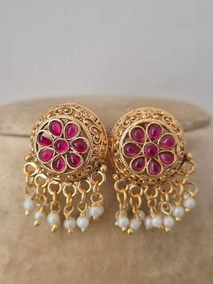 Vintage-style floral earrings, featuring fine flower wirework and a polished earrings with hanging golden beads by naitri.in 