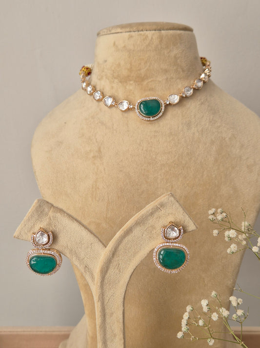 American Diamond Necklace Set with emerald green stone and gold-toned finish by Naitri.in