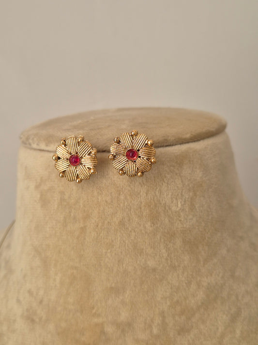 Gold-tone Noor invisible chain necklace and earring set featuring multi-colored stone drops and pearl accents by naitri.in