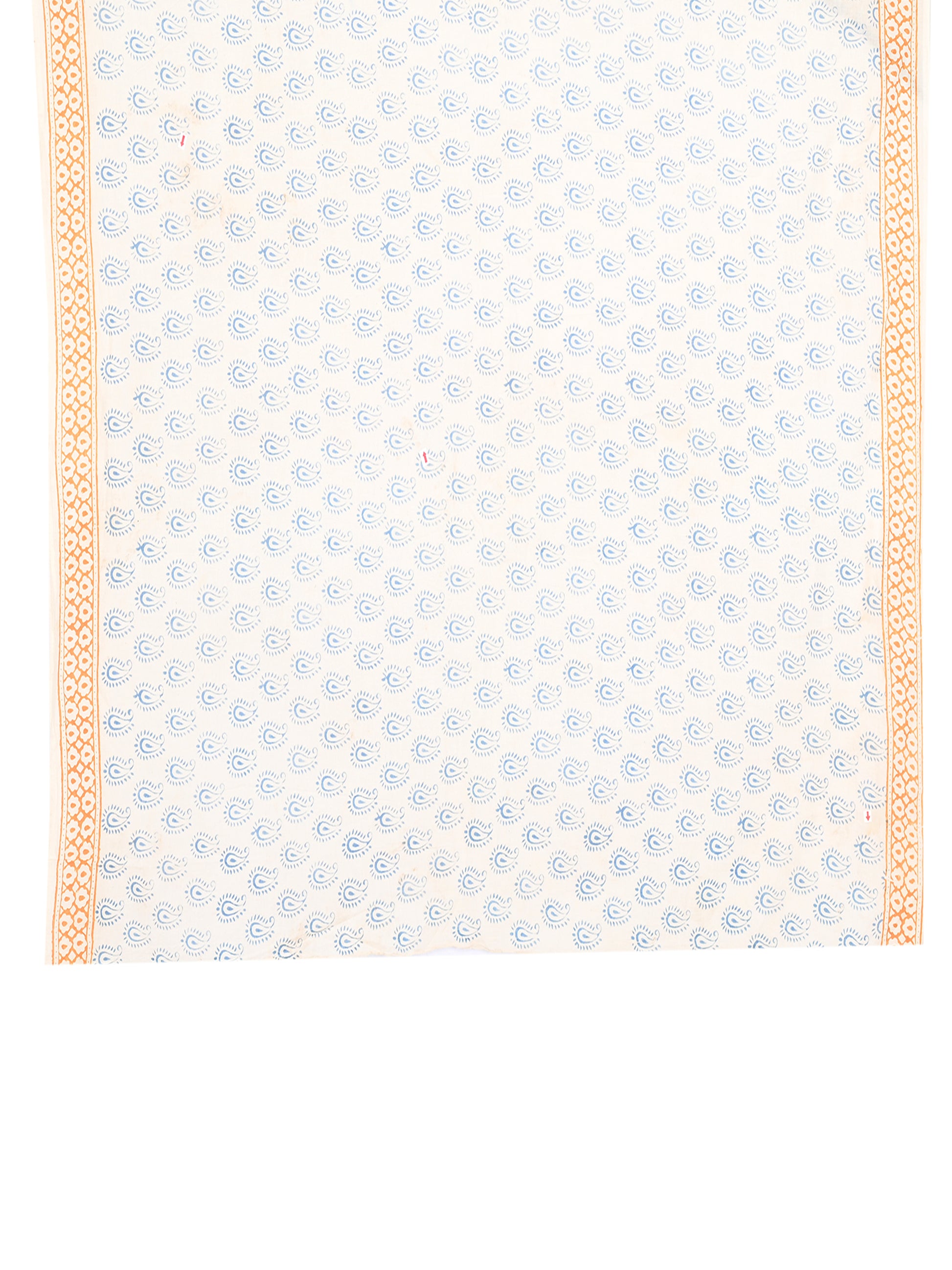 Handcrafted breathable cotton saree from Bagh, Madhya Pradesh, showcasing authentic blue hand block prints on a white base blouse by naitri.in