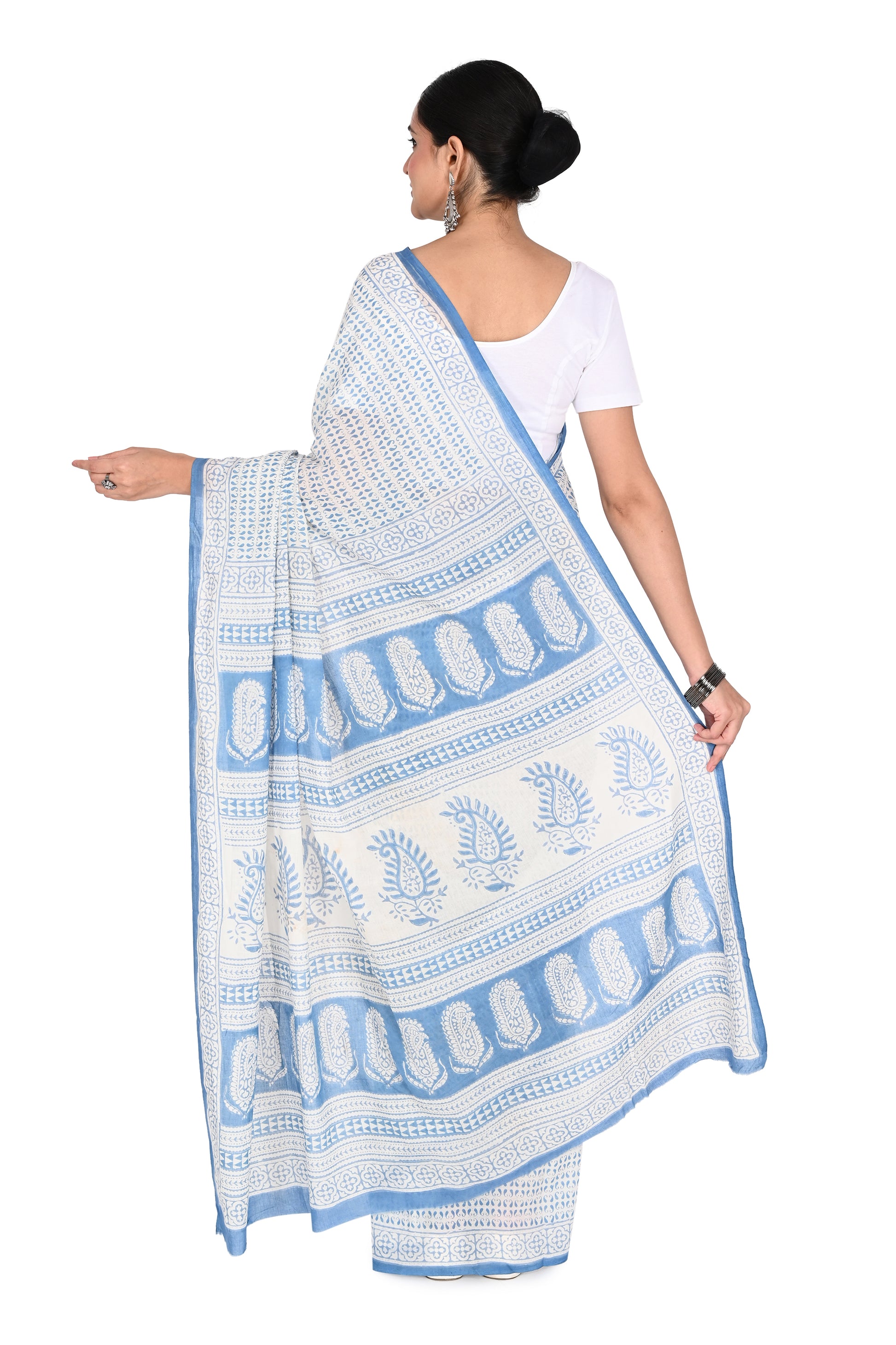Lightweight and breathable Pari cotton saree in white with blue block print patterns, styled for a modern Indian aesthetic by naitri.in
