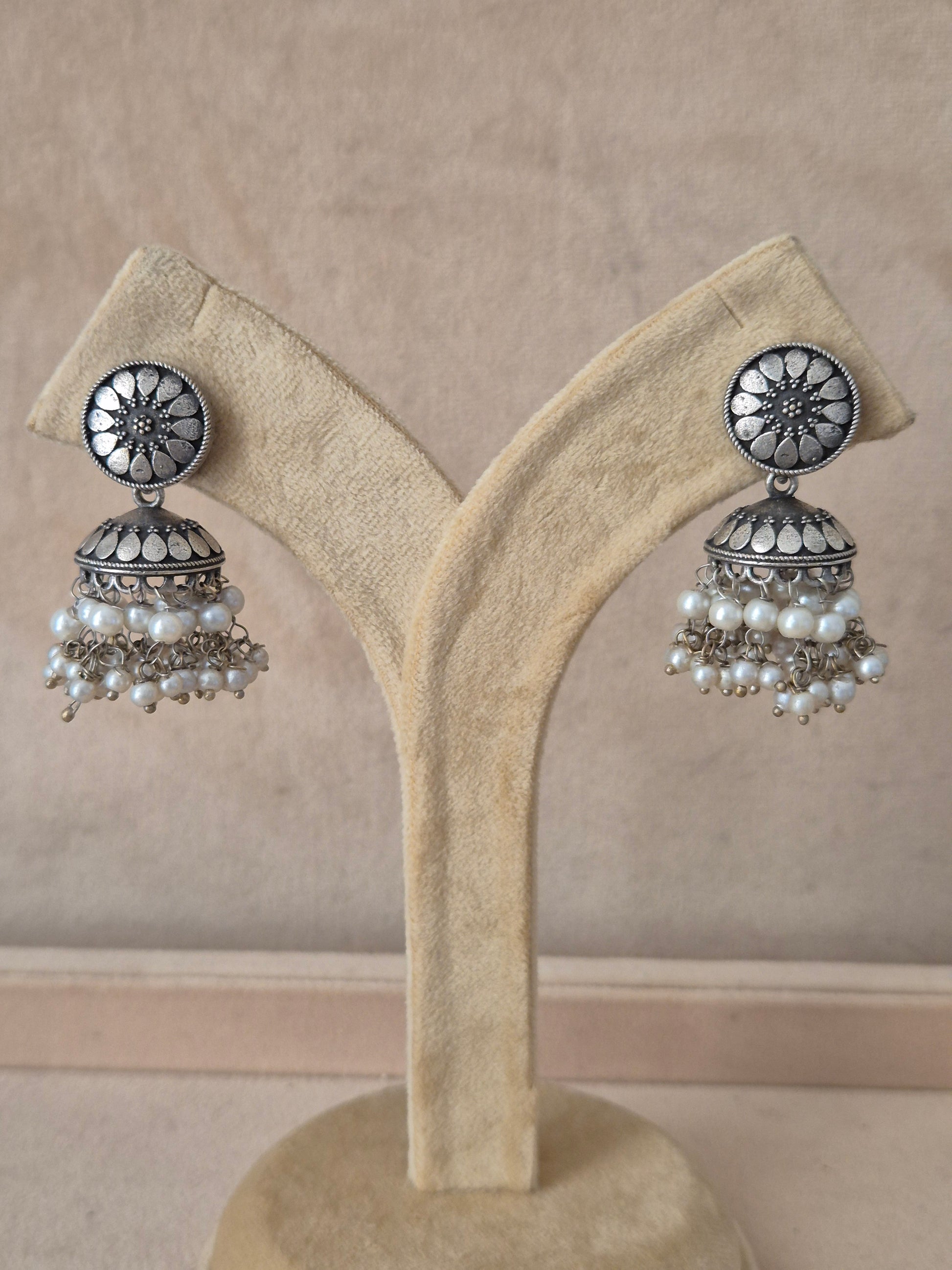 Naitri premium Paro oxidized silver jhumka earrings from the Silver Jewellery collection, Handcrafted silver oxidized drop earrings with detailed jhumka bells and delicate pearl beads by naitri.in