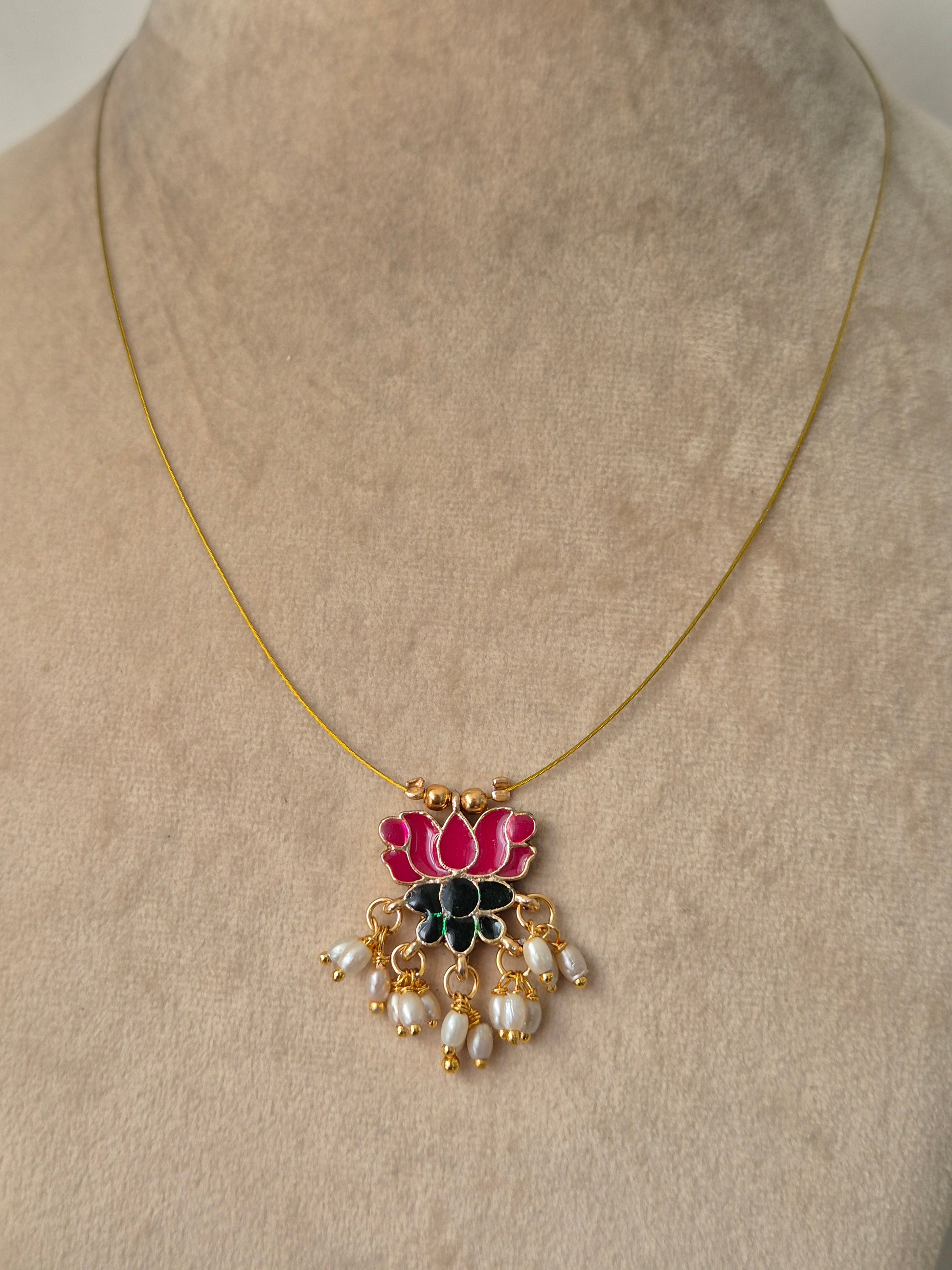 Gold plated necklace with pink lotus, golden beads and some small pearls, hanging from lotus pendant Timeless, High-quality by naitri.in