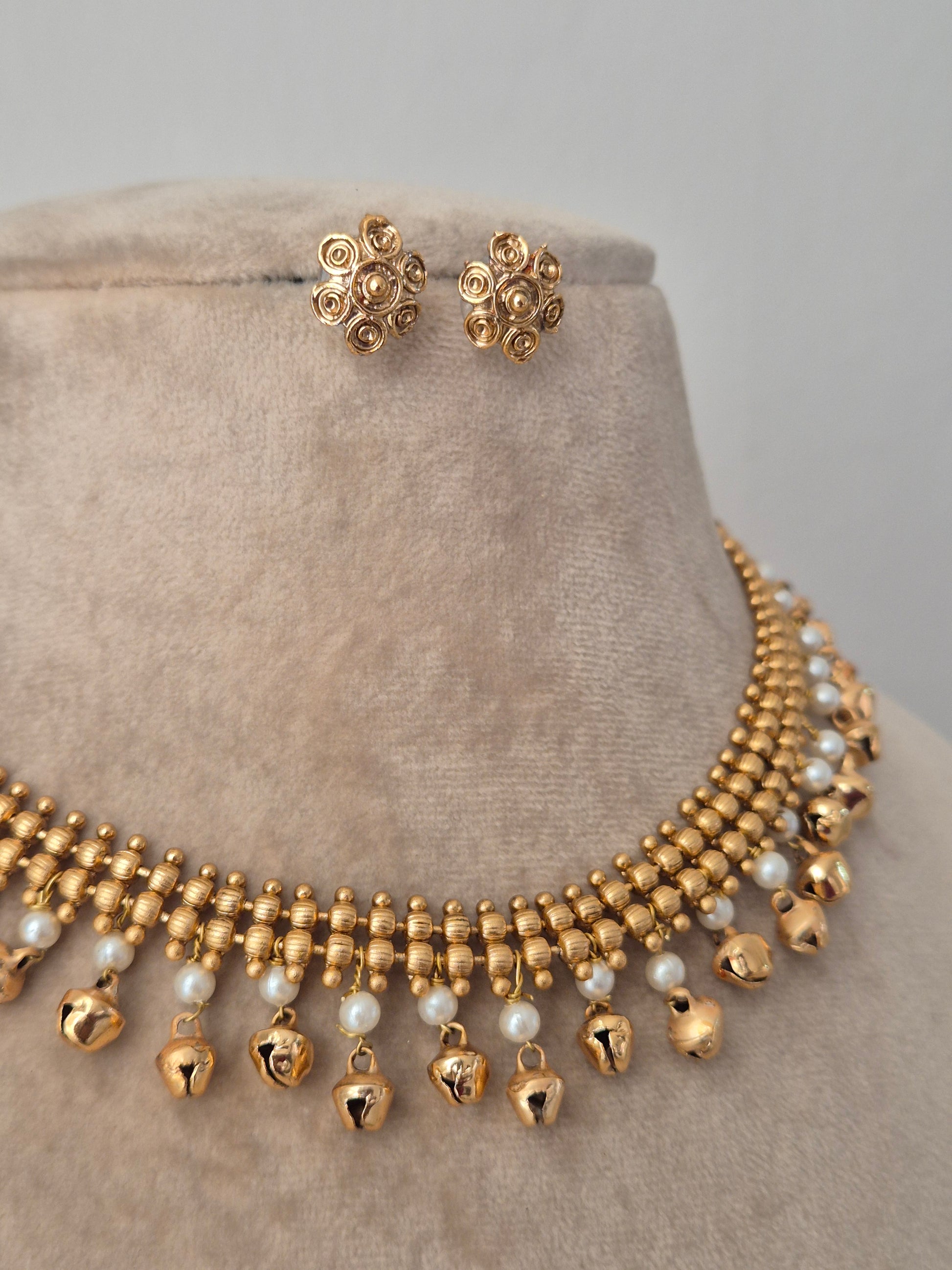  combination of gold and pearl and ghungroo beads and golden imitation jewellery set by naitri.in
