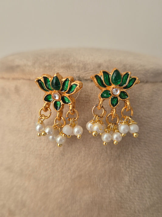 Pair of gold earrings with green leaves and white pearls minimal and aesthetic design by naitri.in 
