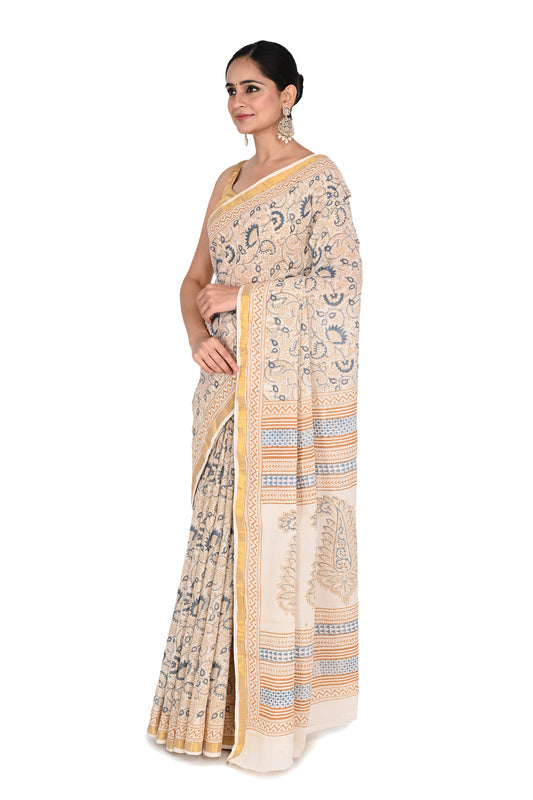 Punya Hand Block Printed Cotton Saree featuring traditional Bagh print designs in blue and beige on a white base by naitri.in