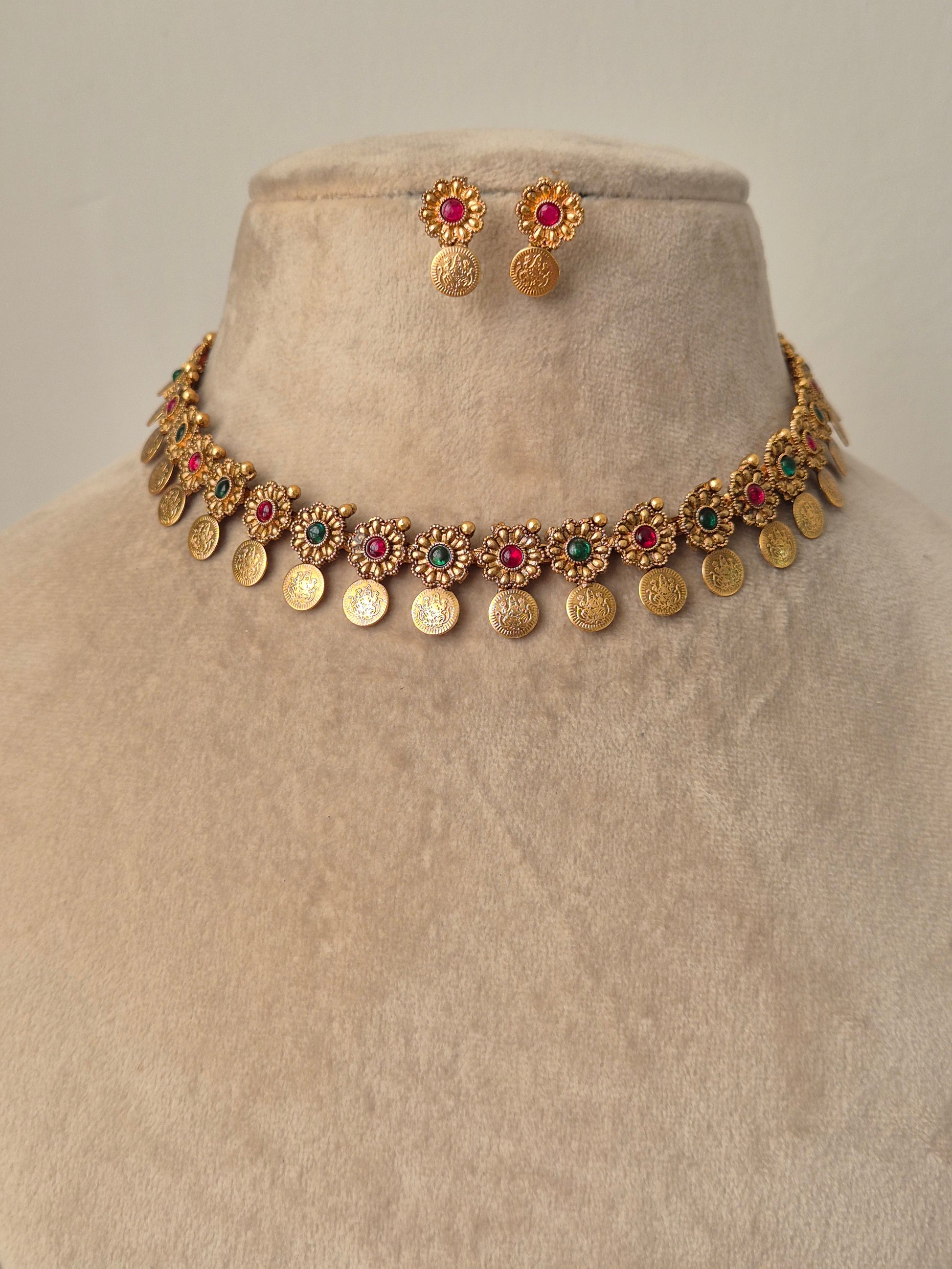 Gold necklace with colorful stones brass necklace  flora and coin designed and colourful stones by naitri.in