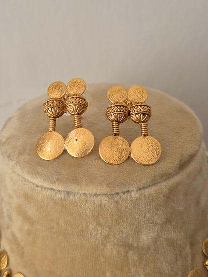 Gold-plated brass earrings with a dangling textured coin fringe by naitri.in