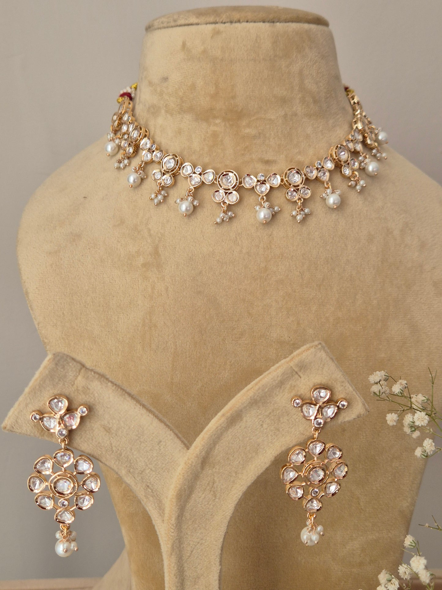 American Diamond Necklace Set with floral motifs and white pearl drops on a rose-gold toned alloy base by Naitri.in