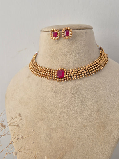 Close-up of a traditional Indian necklace set with stone by Naitri.in