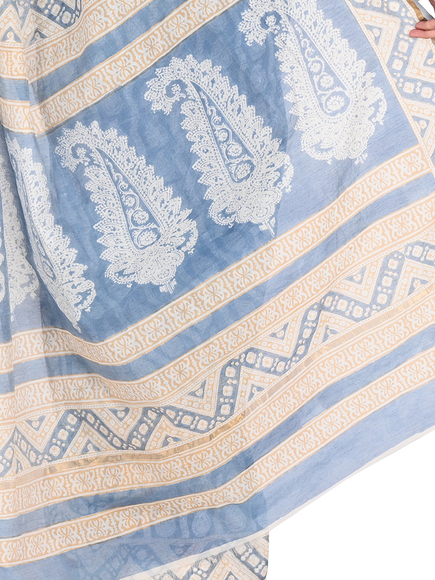 Close-up shot of the soft cotton silk fabric texture and gold border of the beige Rini Maheshwari hand-blocked saree by naitri.in