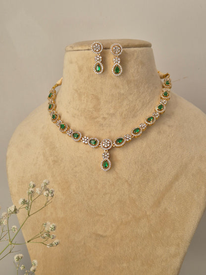 Modern Indian ethnic necklace set with delicate green stone pendants and matching earrings, perfect for festive and party wear by naitri.in