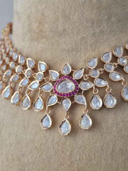 Modern Indian Rosalie necklace set with shimmering AD stones and ruby-red centers by naitri.in