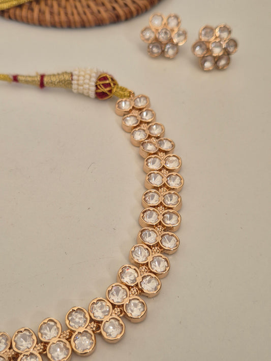 Modern Indian rose gold choker necklace featuring double-layered American diamond crystals and matching flower studs by naitri.in
