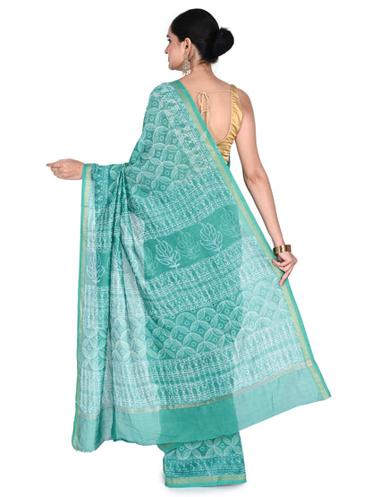 A teal hand-block printed saree handcrafted in Bagh, Madhya Pradesh, blending traditional heritage motifs with a contemporary silk-blend finish by naitri.in