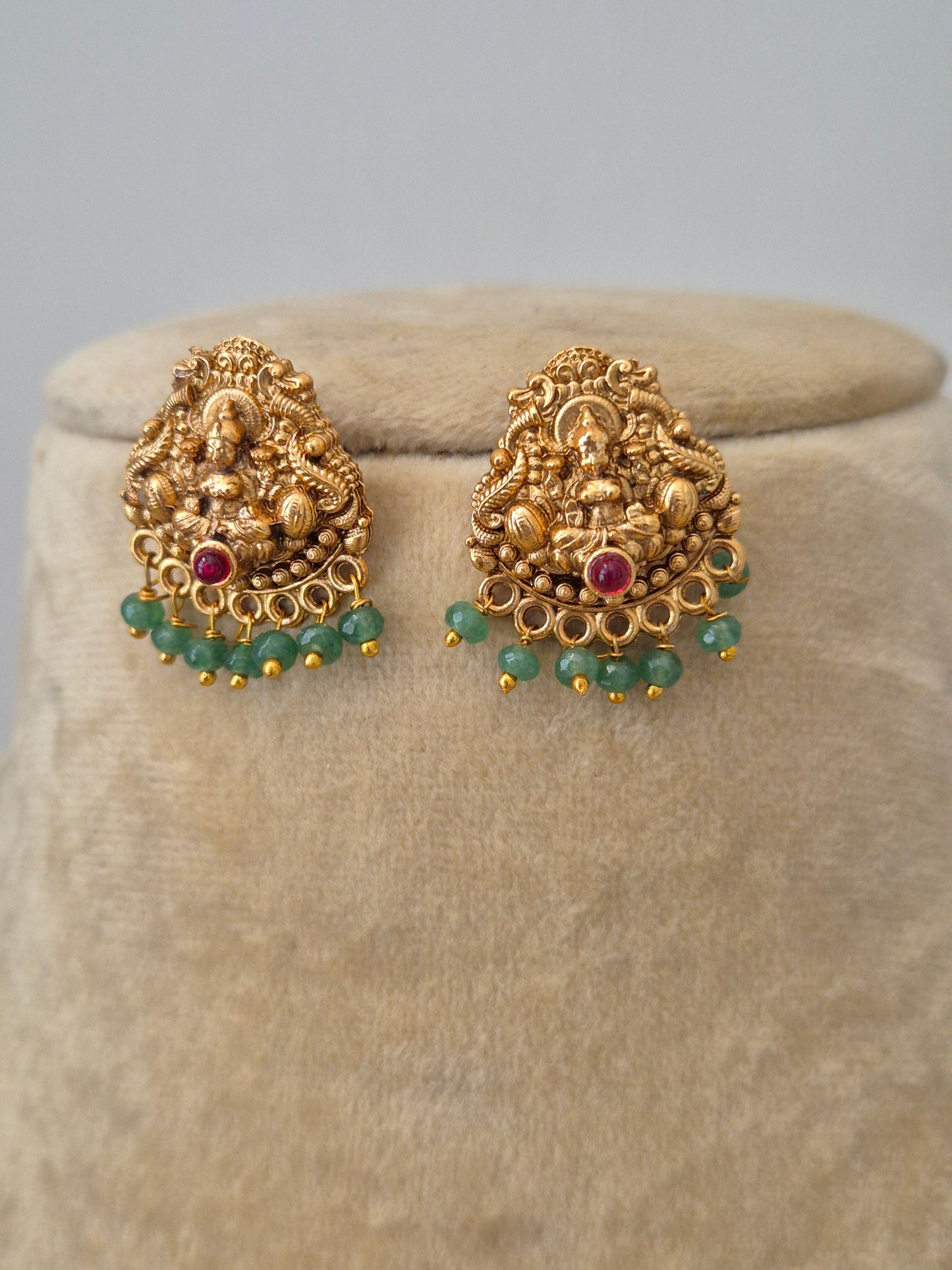 Gold Temple earrings, hanging green seed beads by naitri.in