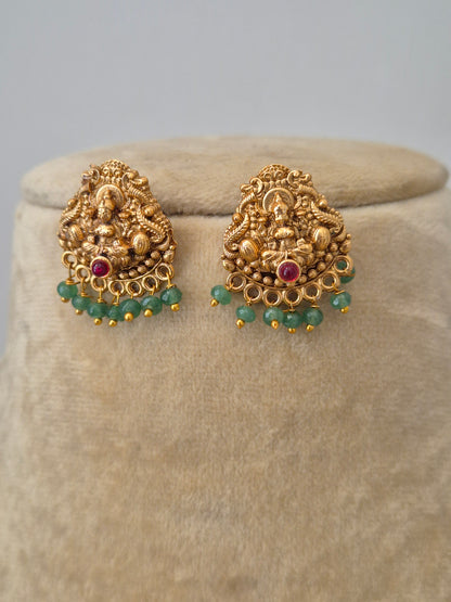 Gold Temple earrings, hanging green seed beads by naitri.in