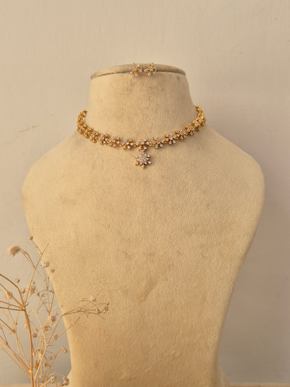 Handcrafted brass alloy choker necklace and matching earrings by Naitri