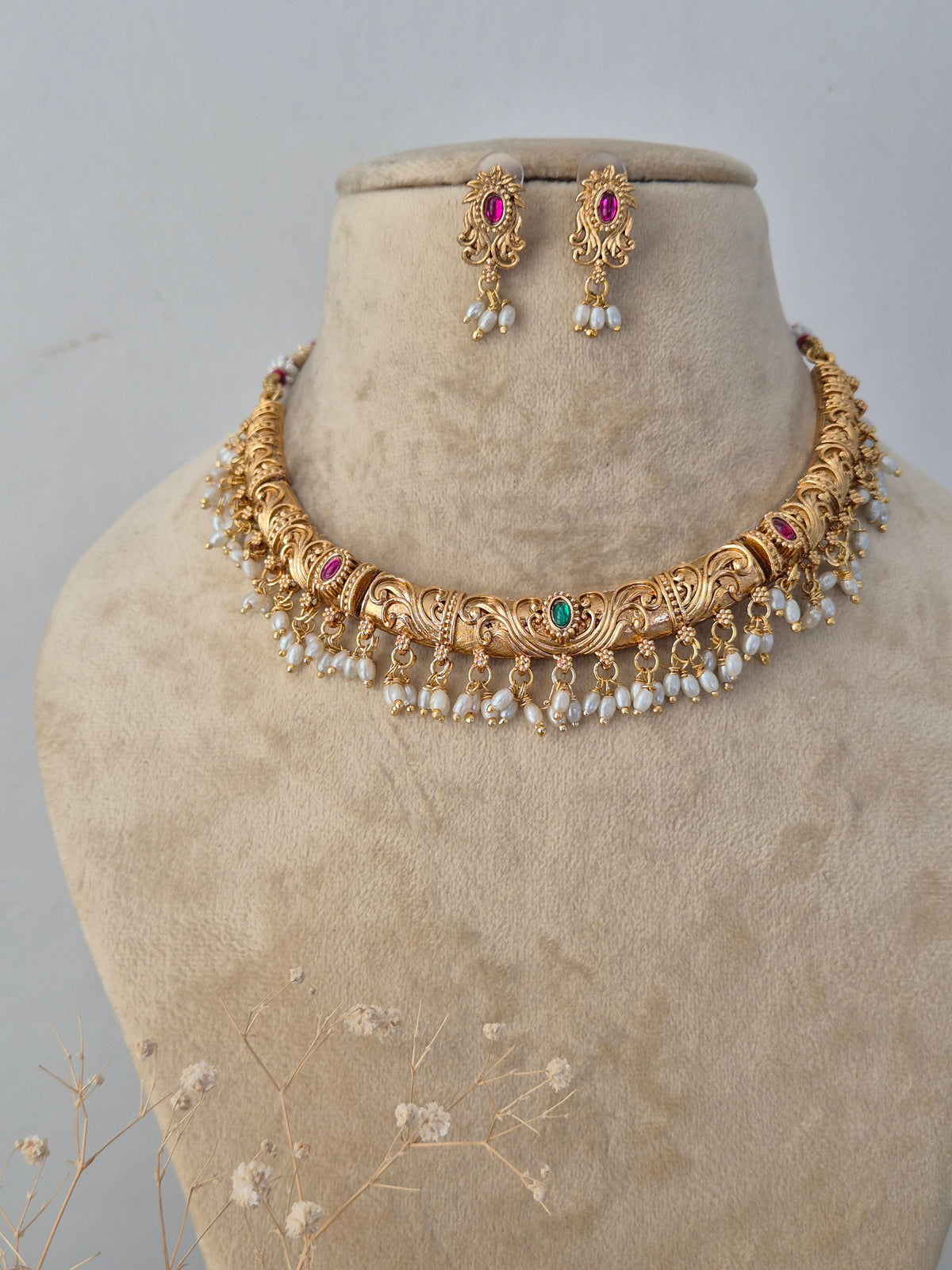 Santoshi traditional golden ethnic necklace and matching earrings set traditional handcrafted necklace set by Naitri.in