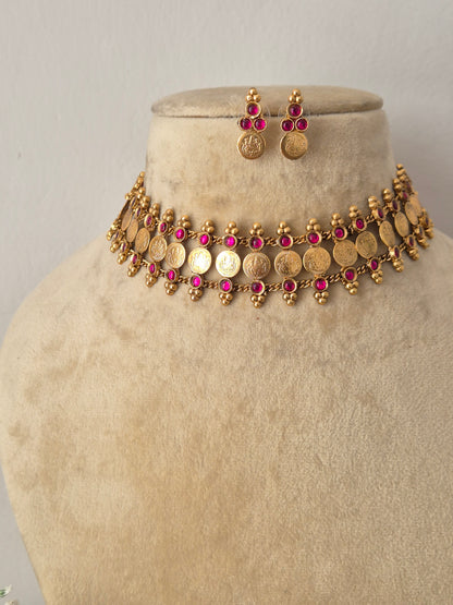 Elegant green gemstone and gold-toned ethnic coin jewelry set, gold-plated choker and earring set with green beads by naitri.in