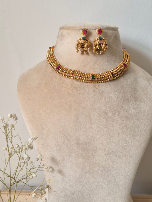 Traditional elegant necklace set with green and red stones with Jhumki available at naitri.in