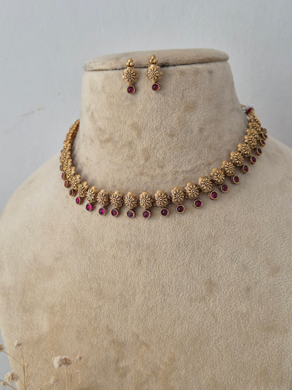 Gold-plated traditional Simran necklace and earring set by Naitri.in