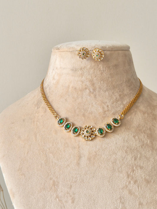 Handcrafted Smriti Gold Necklace Set with green gemstones by Naitri