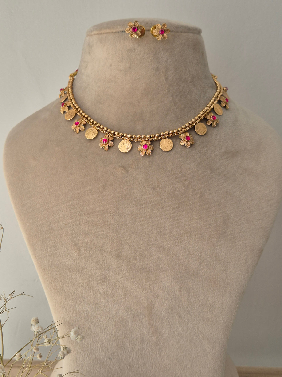 Gold necklace with pink stones coins and flowers design necklace minimal design by naitri.in 
