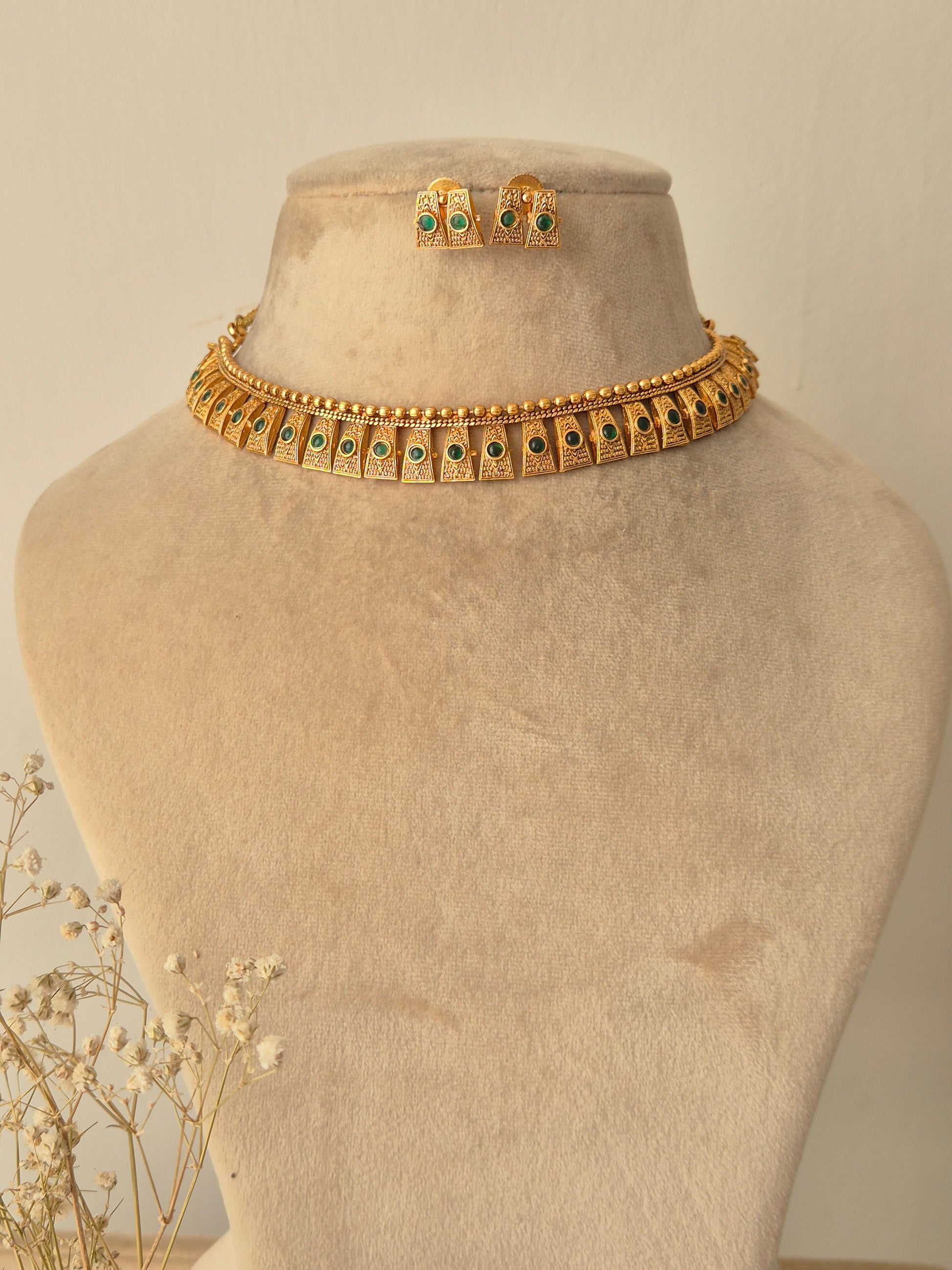 Gold necklace with green stones necklace traditional design by naitri.in
