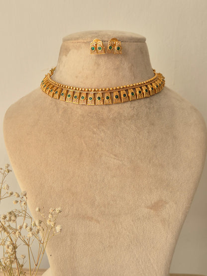Gold necklace with green stones necklace traditional design by naitri.in