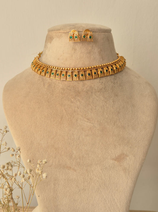 Gold necklace with green stones necklace traditional design by naitri.in