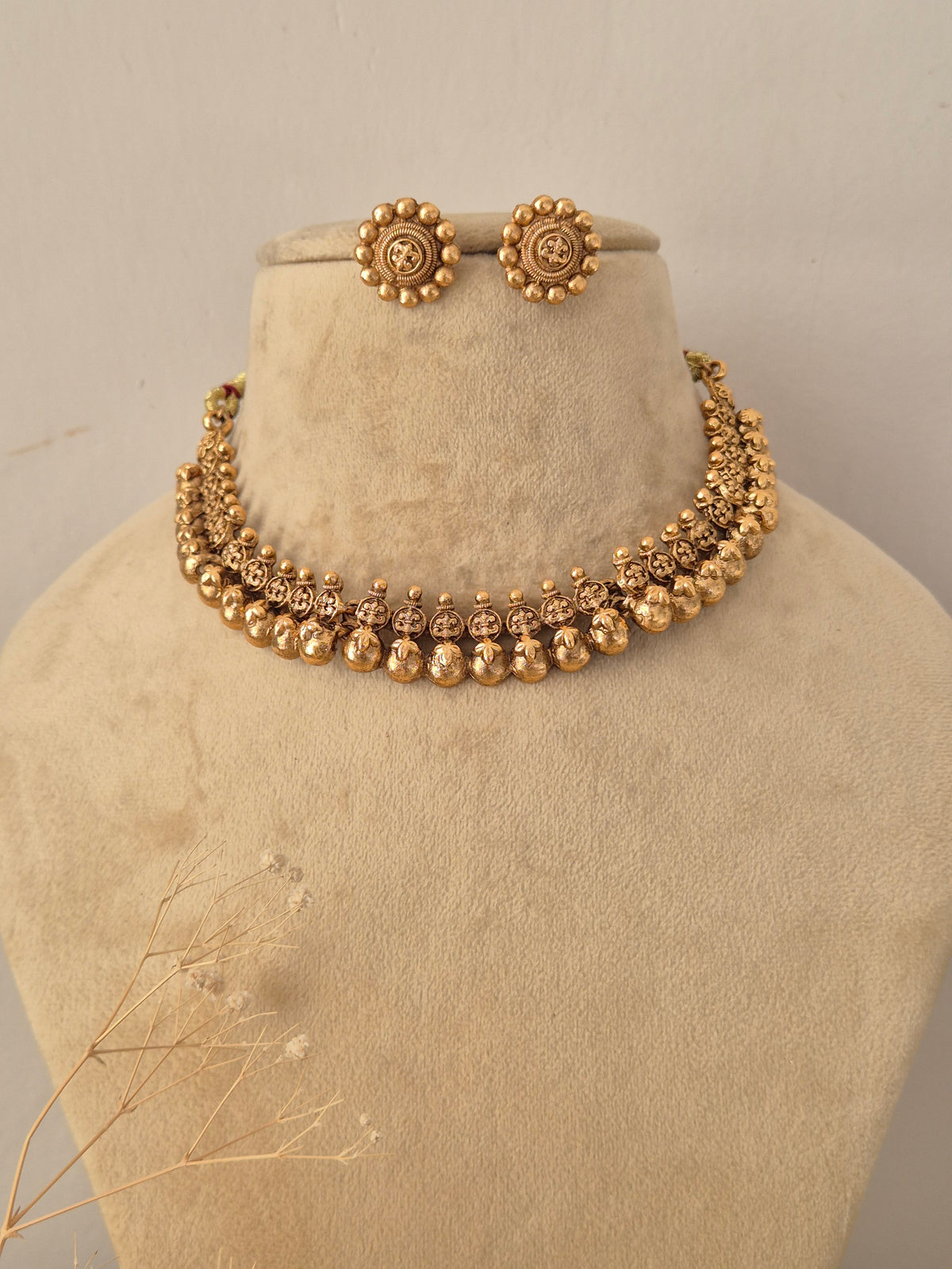 Tanya Necklace Set - Traditional antique gold-toned brass alloy temple jewelry choker and earrings by Naitri.