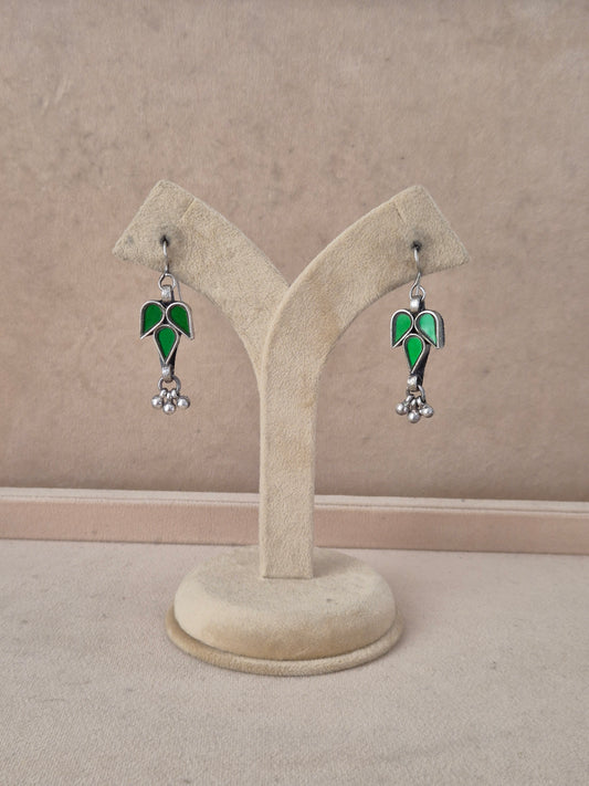 Glass Earrings featuring handcrafted green glass in a leaf design with small silver beads by naitri.in