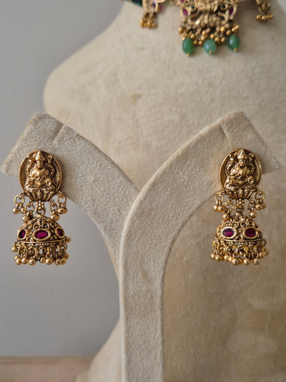 Antique gold earrings goddess Lakshmi motif , gold drops, ruby pink stones by naitri.in