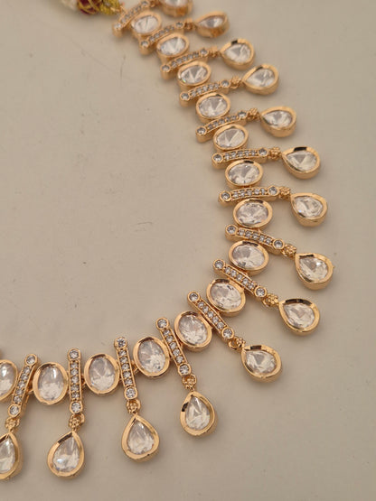 Victoria AD Necklace Set: A statement gold-plated choker with teardrop American Diamonds and coordinating festive by naitri.in