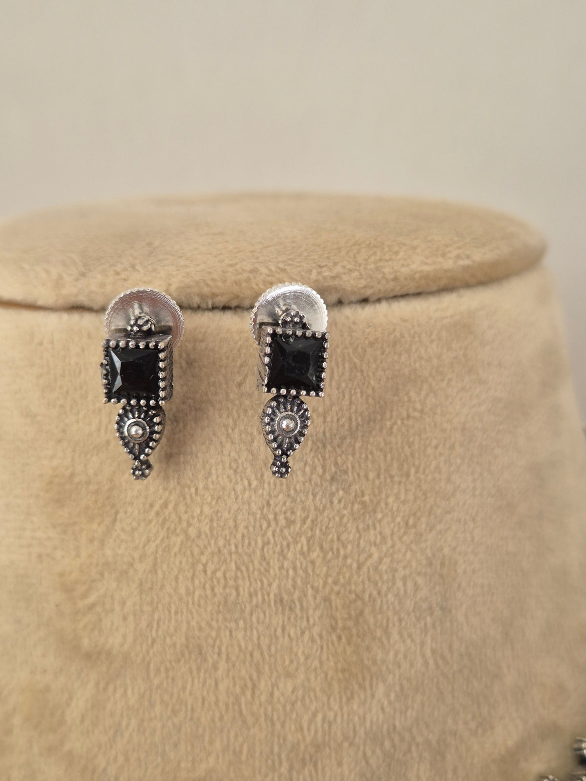 Handcrafted oxidized silver earrings with black stone by naitri.in