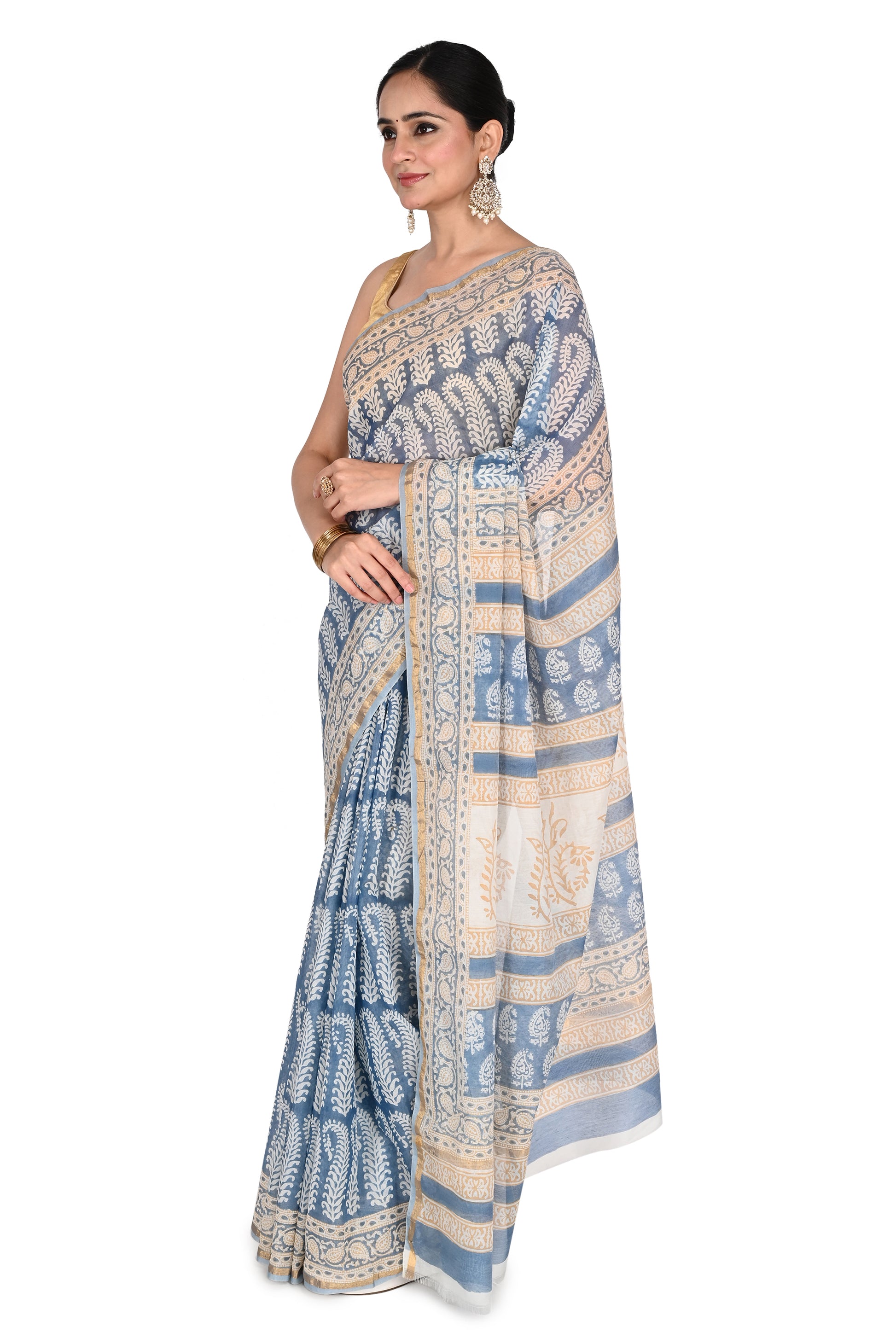 Classic drape of a blue and white cotton silk saree with artisanal Bagh prints, ideal for occasion or casual wear by naitri.in
