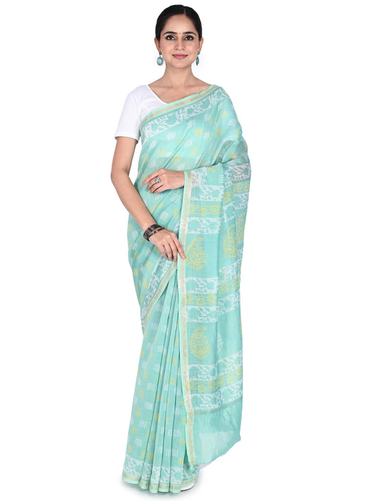 a woman wearing the seafoam green Jency hand block printed cotton-silk saree, showing the detailed pallu draped over the shoulder by naitri.in
