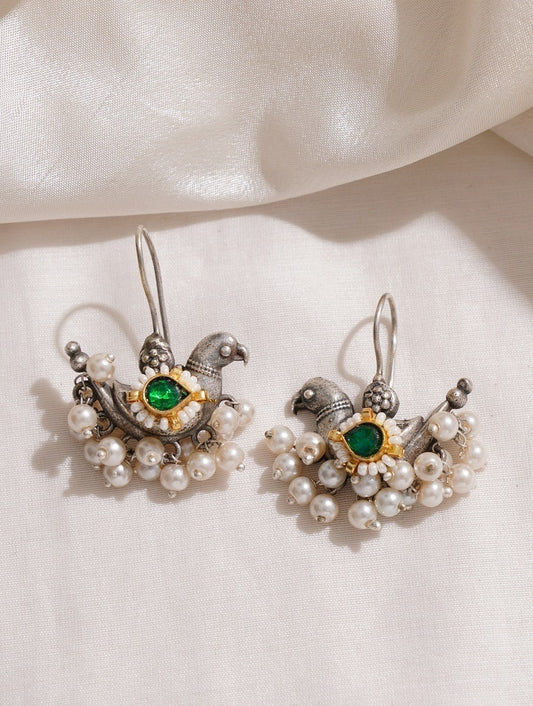 Silver-toned stud earrings, Garima by Naitri, shown on simple white.