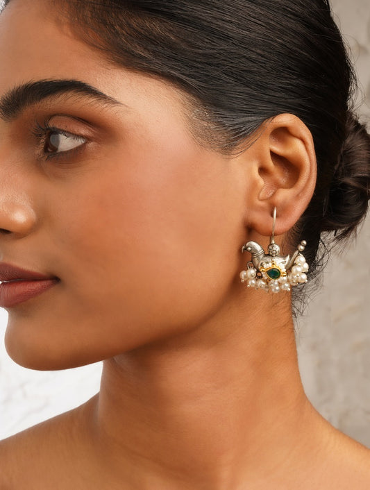 Silver-toned stud earrings, Garima by Naitri, shown on simple white.